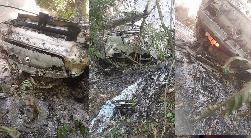 Dentro de una yipeta, situada cerca del muro de la presa de Hatillo